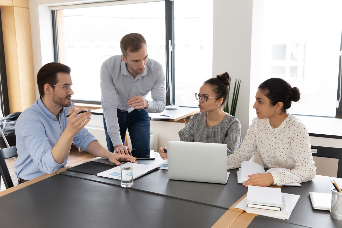 Concentrated Young Colleagues Brainstorming in Office